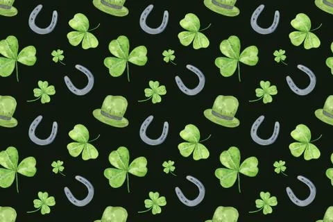 A repeat pattern of horseshoe, top hat and shamrock plant leaves on the black イラスト素材