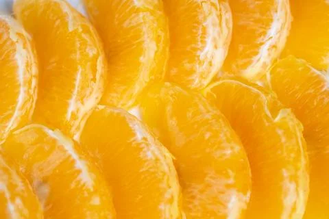 Repeated orange pieces create dynamic branding and packaging visuals. Color.. 스톡 사진