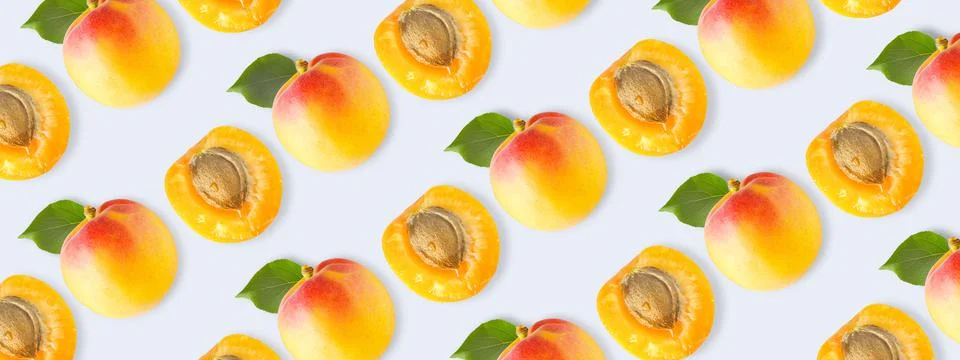 Repeating apricots pattern on a light background Stock Photos
