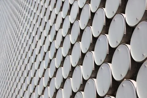 Repeating circles geometric pattern on a modern building exterior Stock Photos