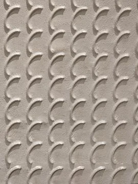 Repeating curved textured wall pattern 스톡 사진