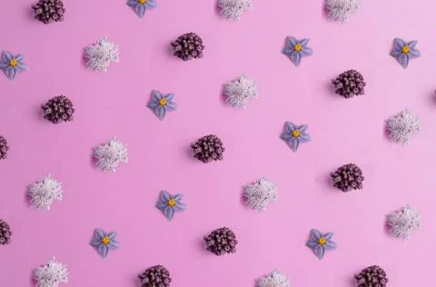 Repeating flowers on a pink background Foto stock
