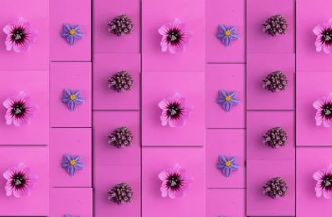 Repeating flowers on a pink background Foto stock