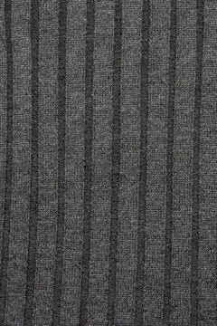 Repeating Machine Knitting Texture of Sweater. Knitted Background. Cable knit Фото