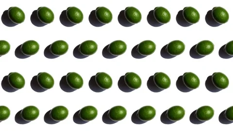 Repeating pattern of deep green lemons, rotating clock and counterclock-wise. Stock Footage 244437957
