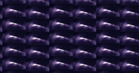 Repeating pattern of dramatic purple cloudscapes. Stock Footage 309873287