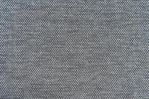 Repeating pattern on gray fabric 库存照片