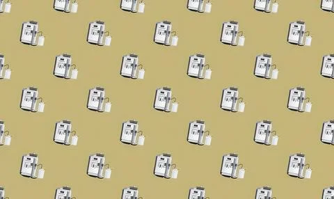 Repeating pattern of medical blood pressure monitors on green background Stock Illustration