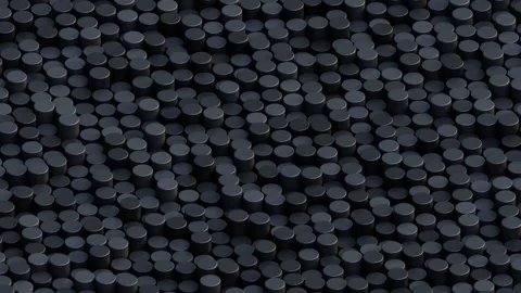 A repeating pattern of numerous small, uniform dark pillars creating a structure Stock Footage 340237550