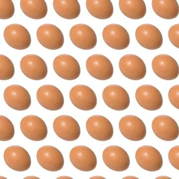 Repeating pattern of raw brown chicken eggs on isolated background Stock Photos