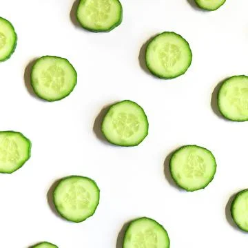 Repeating pattern of sliced semicircles of fresh raw vegetable cucumbers for  Stock Photos