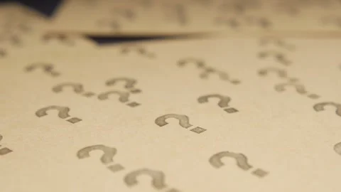 Repeating question mark pattern on paper texture motion background. Stock Footage 332777892
