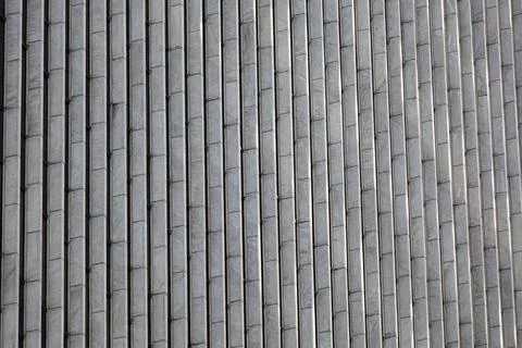 Repeating Vertical Lines on Gray Modern Building Facade Stock Photos