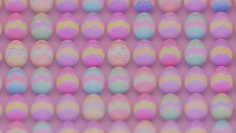 Repetitive Easter egg pattern displayed in an orderly fashion on a solid ba.. 写真素材