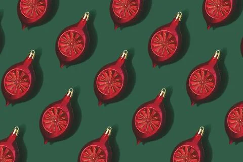 Repetitive pattern made of red colored Christmas baubles. Stock Photos