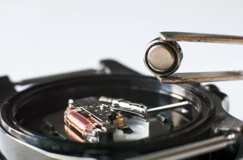 Replace the battery in a wristwatch Foto stock