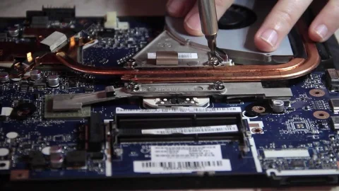 Replace the cooler on the motherboard Stock Footage 71524162
