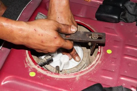 Replace the gasoline filter Stock Photos