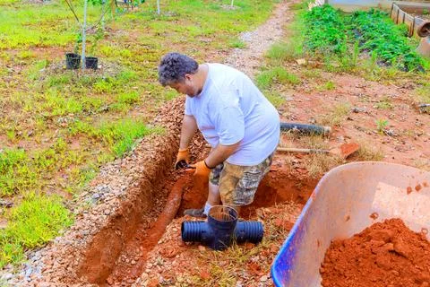 Replace underground storm sewers in trenches groundwater system after damaged Stock Photos