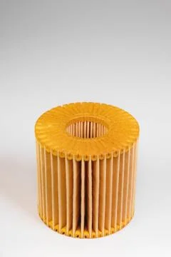 Replaceable cartridge fuel system. New fuel filter element on a gray gradient 스톡 사진