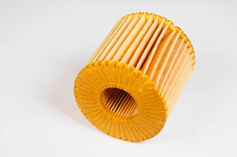 Replaceable cartridge fuel system. New fuel filter element on a gray gradient 스톡 사진