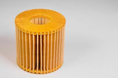 Replaceable cartridge fuel system. New fuel filter element on a gray gradient Stock Photos