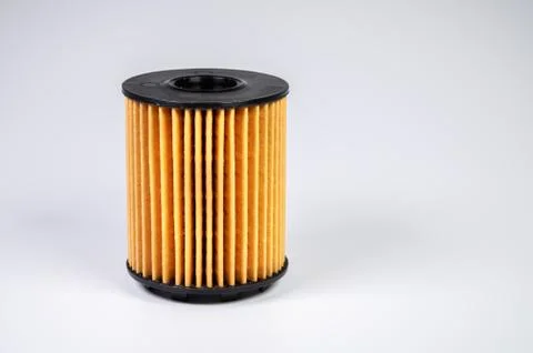 Replaceable cartridge fuel system. New fuel filter element on a gray gradient Stock Photos