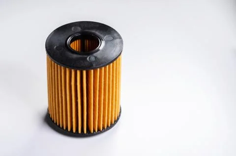 Replaceable cartridge fuel system. New fuel filter element on a gray gradient Stock Photos