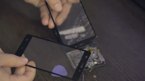 Replacement of broken smartphone screen, cell phone repair Stock Footage 119886529