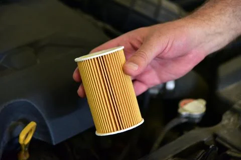 Replacement of car oil filter Stock Photos