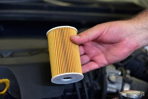 Replacement of car oil filter Stock Photos