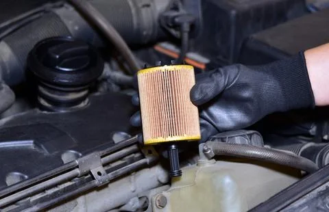 Replacement of car oil filter Stock Photos