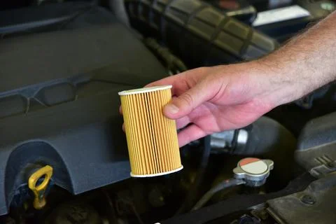 Replacement of car oil filter Stock Photos