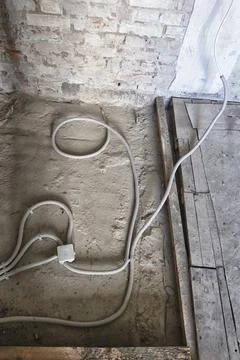 Replacement of the electrical cable in the old apartment Stock Photos
