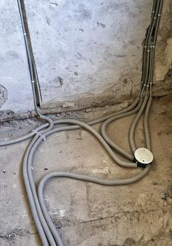 Replacement of the electrical cable in the old apartment Stock Photos