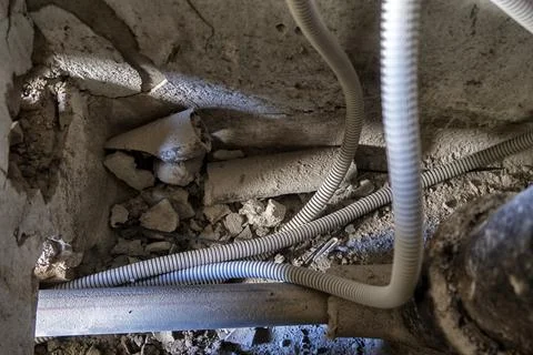 Replacement of the electrical cable in the old apartment Stock Photos