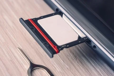 Replacement of nano sim card chip in modern smartphone, Close-up view. copy.. Foto stock