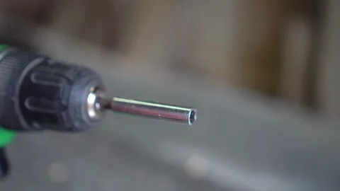 Replacement of a nozzle on a screwdriver Stock Footage 152402406