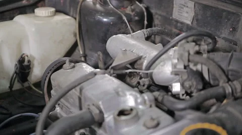 Replacement of an oil filter Stock Footage 64533223