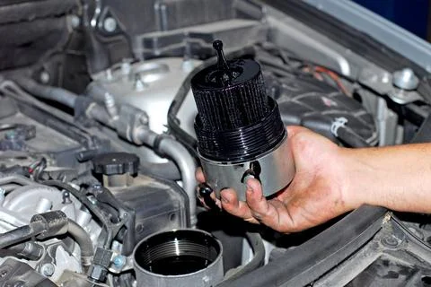 Replacement of oil filter Stock Photos