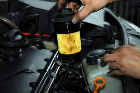 Replacement of oil filter Stock Photos