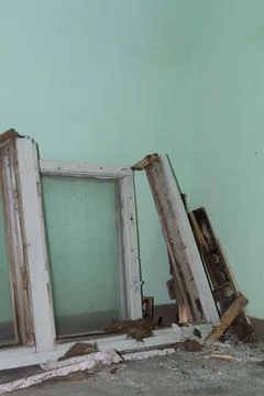 Replacement of old windows. Replacement of old wooden windows with plastic .. Stock Photos
