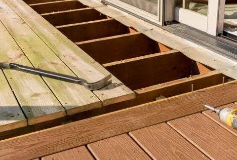 Replacement of old wooden deck with composite material Stock Photos
