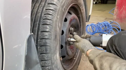 Replacement Wheel Screwing Machine Bolting Stock Footage 185581986