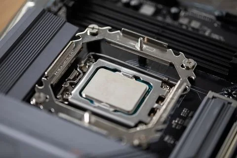 Replacing and installing a new processor in a home laptop computer 写真素材