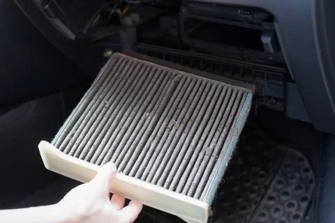 Replacing the ar cabin filter the car. Replacing Dirty Air filter Stock Photos