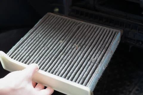 Replacing the ar cabin filter the car. Replacing Dirty Air filter Stock Photos