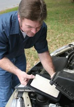 Replacing Auto Air Filter Stock Photos