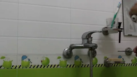 Replacing bath faucets Stock Footage 69186920