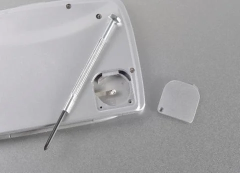 Replacing the battery in the device Stockfoto's